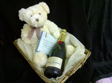 Champagne and chocolate basket with teddy