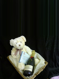 Champagne and chocolate basket with teddy